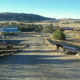 CInaha Springs Youth Camp: Entrance and buildings in desert landscape