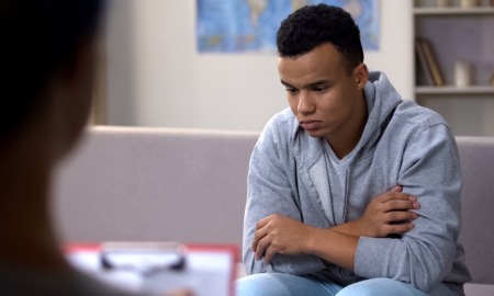 community youth violence prevention and intervention grants: male teen talks to therapist