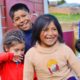 tribal child welfare: happy native american children outside building