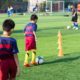 youth sports access grants: children practicing soccer