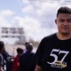 Selma youth voting rights activism: young minority youth looking at camera during march