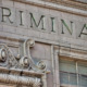 FL juvenile justice: Exterior of ornate, older building with word "criminal" etched in stone.