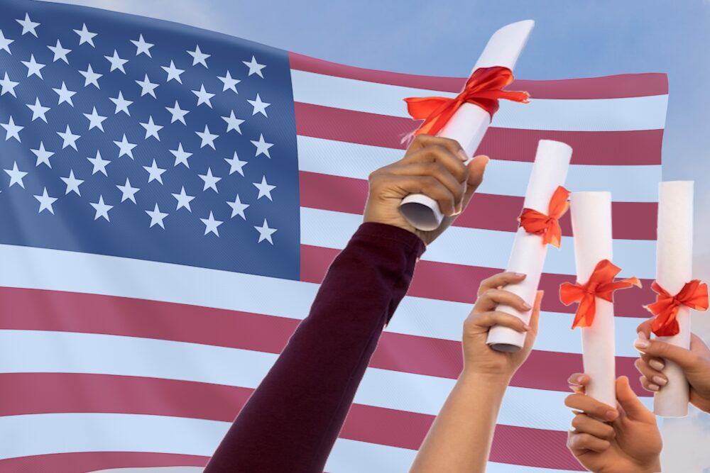 Older Immigrant student school admissions: 5 outstretched arms with hands holding rolled-up document tied with red ribbon against background of American flag