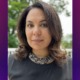 Nicole Rodriguez Leach named executive director of Grantmakers for Education: woman with medium length dark hair and and dark shirt outside