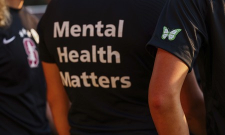 pandemic youth mental health toll unprecedented: view of person wearing black t-shit with "Mental Health Matters" on the back