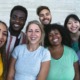 preventing and ending youth homelessness report: group of diverse youth smiling at camera