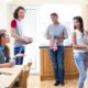 Supportive housing for former foster youth report: group of youths in a sunny kitchen together