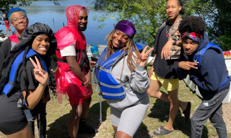 freedom schools: group of teens in lifejackets having fun at lake