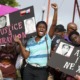 Trayvon Martin 10 Years Later: image of protestors marching in the wake of Trayvon's death