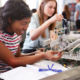 BIPOC girls in STEM; two female students working on STEM project