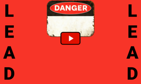 lead poisoning: sign on red background "Danger"