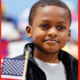 Land of Inopportunity: Closing the Childhood Equity Gap report; young black child holding American flag